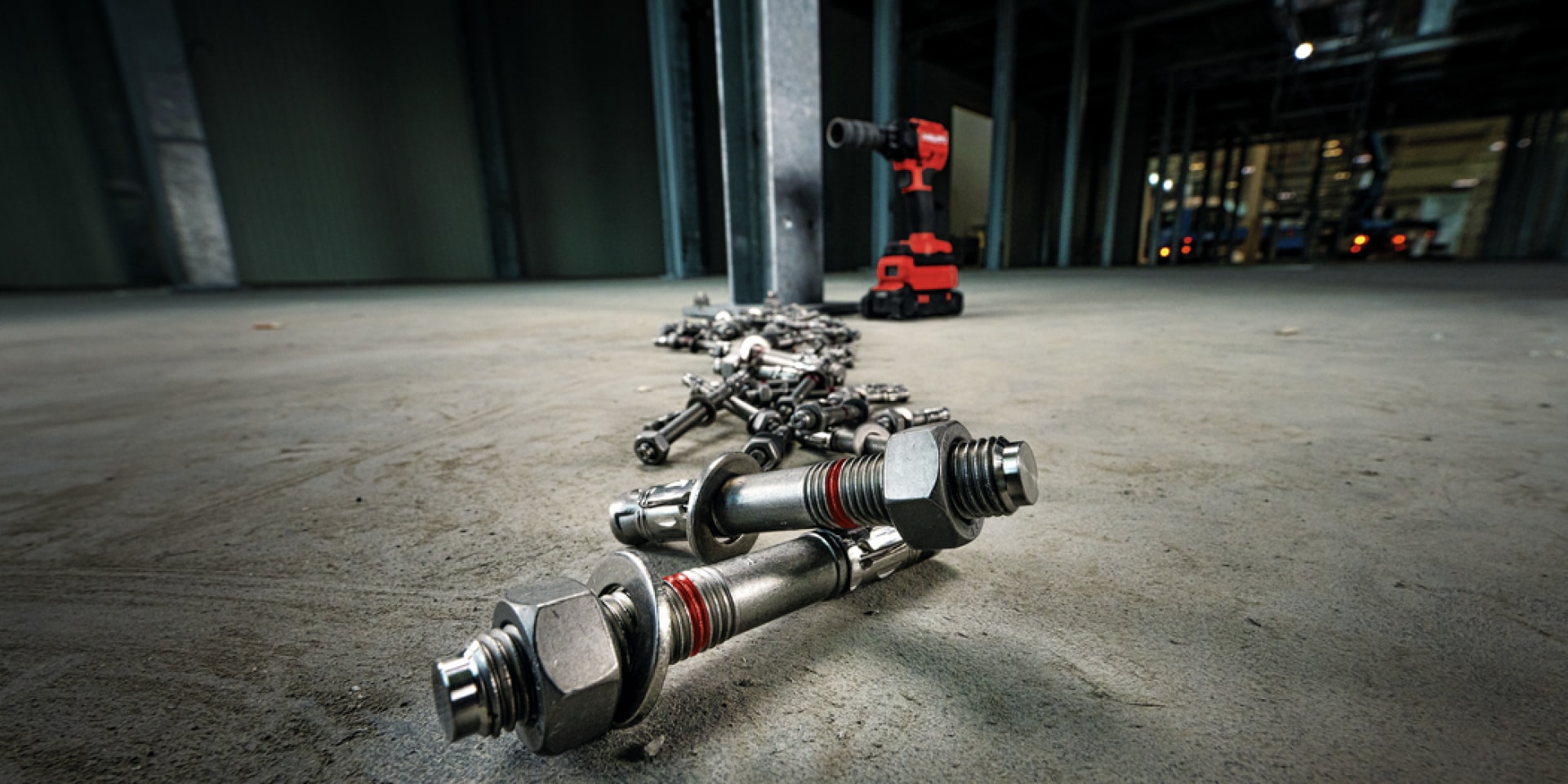 Portfolio image of various HST4 wedge anchors and the cordless impact wrench SIW 6AT-22