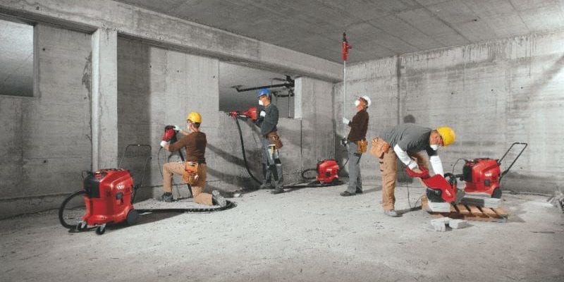 Image of all the full portfolio of Hilti vacuum cleaners being used on the construction site