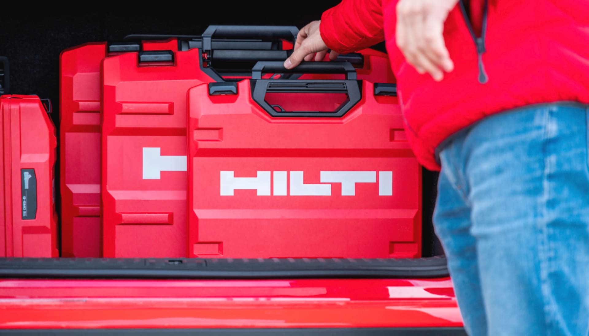 Tool Crib Manager putting away a Hilti Tool Box on a shelf in the warehouse