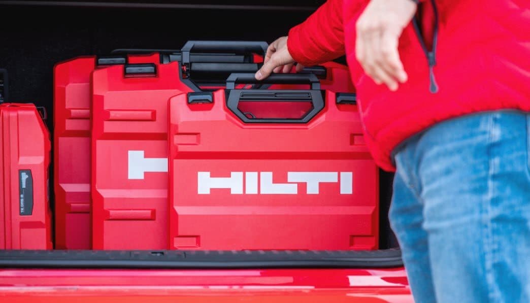 Tool Crib Manager putting away a Hilti Tool Box on a shelf in the warehouse